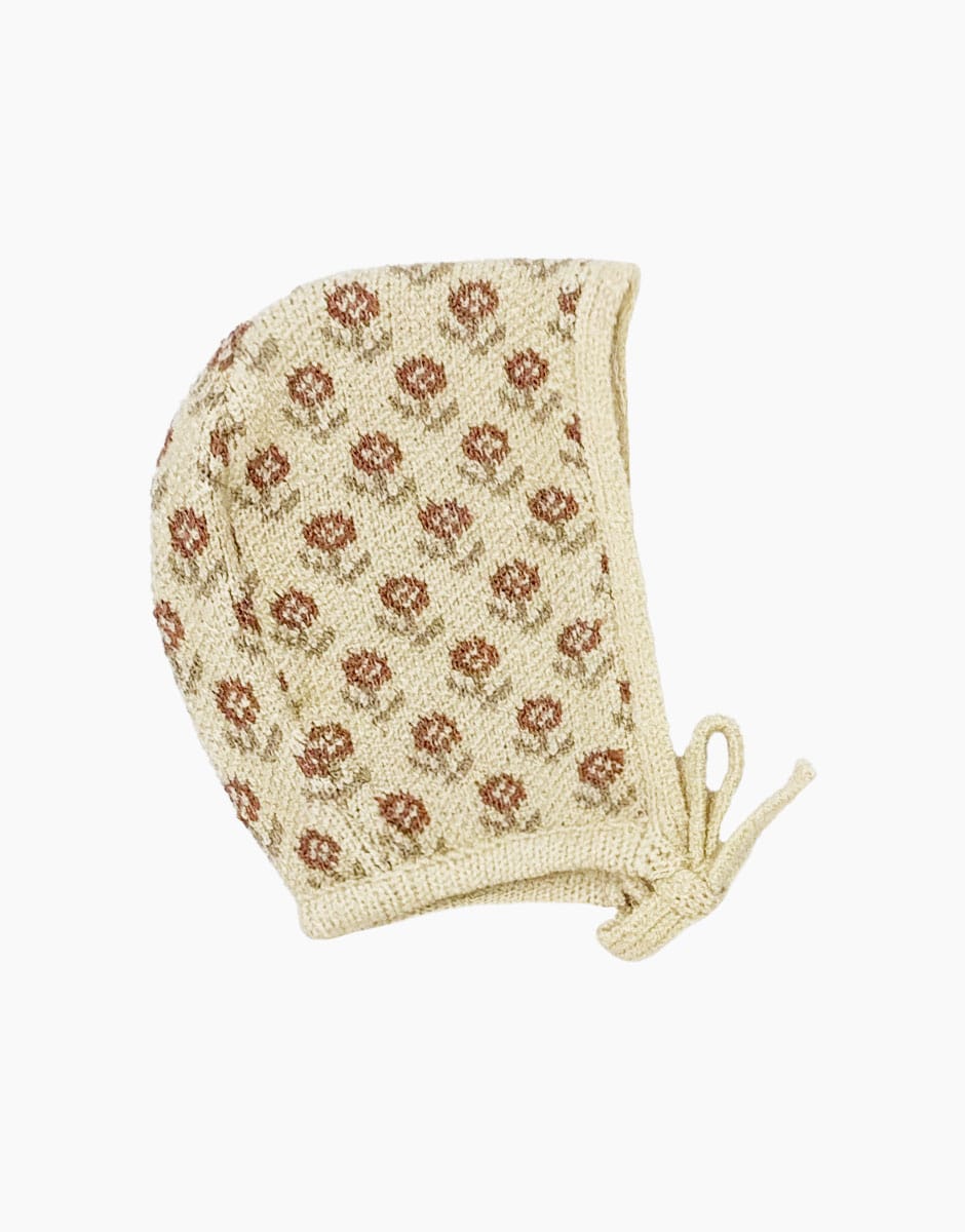 Minikane Élie Puppen-Strickmütze Wildflowers Brick