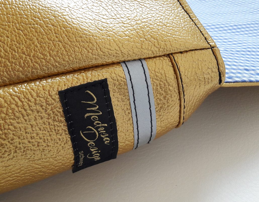 Medusa Schultasche Gold mit Blumen